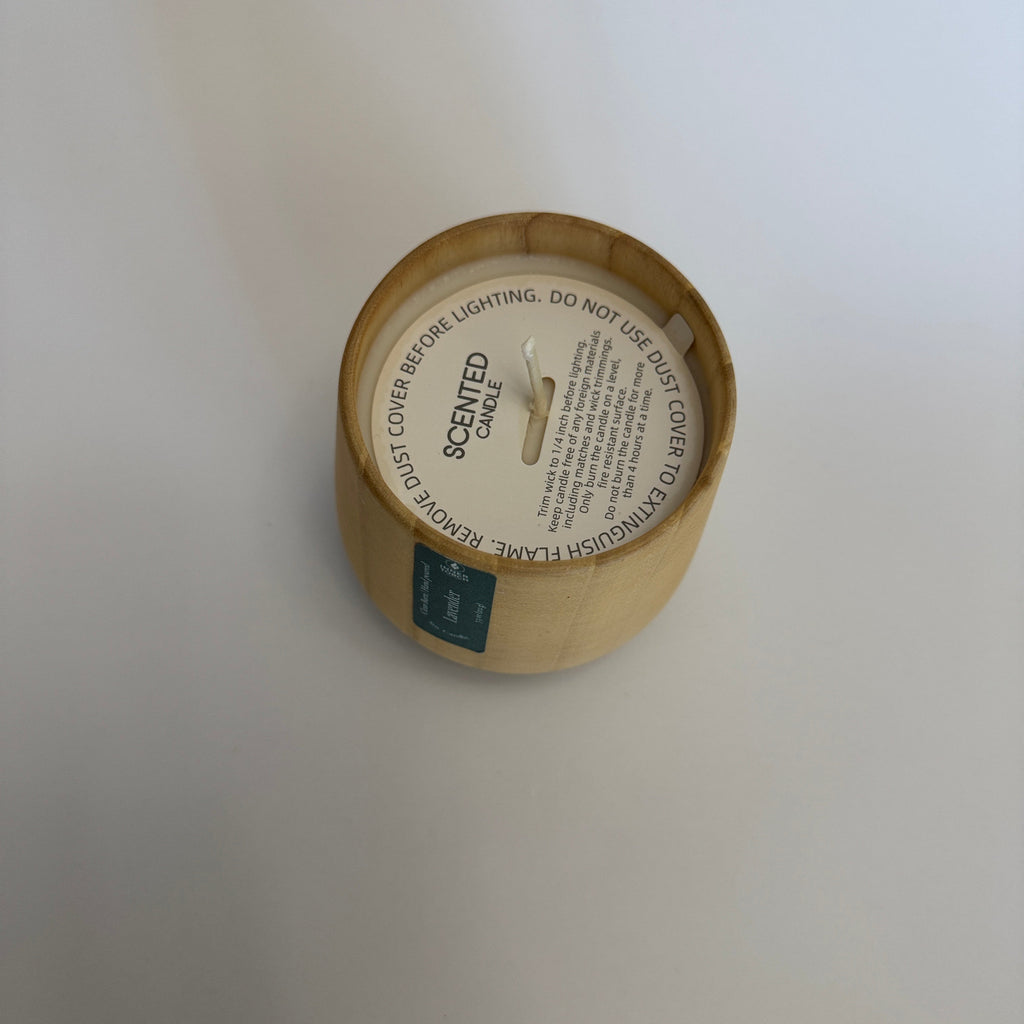 Round cardboard product packaging with a label on a white background