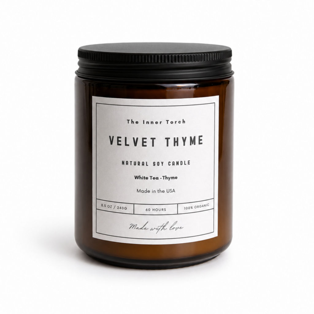 Velvet Thyme candle with a black lid on a white background